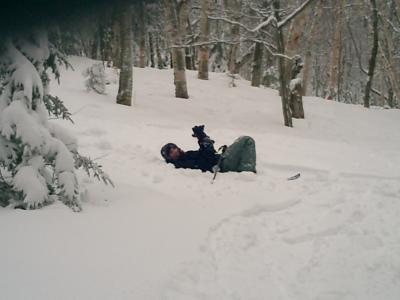 Me falling and sinking into inches of snow