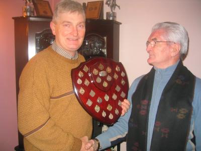 Noel and Dad with the hurling plaque
