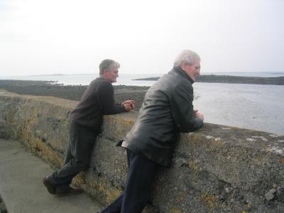 Berty and Dad at the quay in Aran, where they  worked growin up