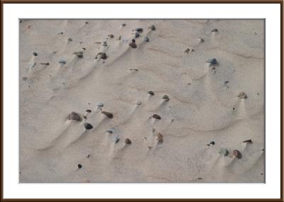 Sand, pebble, wind