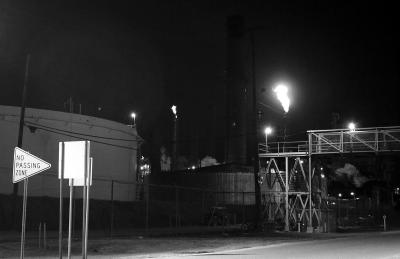 refinery at night bw