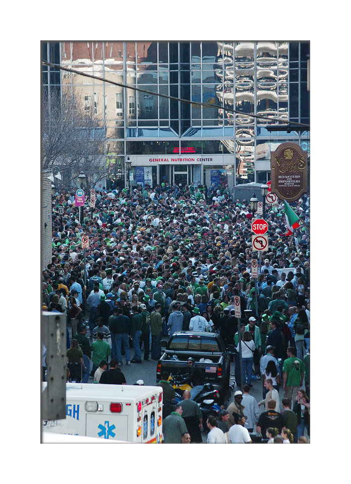 The young put their minds elsewhere as beer flows on the Saturday before St. Patricks Day in Market Square.