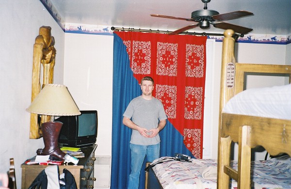 In our Wild West themed room.  Notice the spiffy bandana curtain and cowboy boot lamp!!!