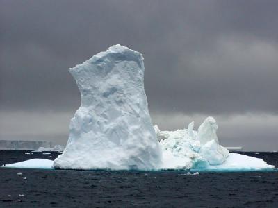 Dramatic sky & iceberg