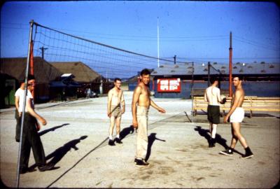 George Phillips in tan shorts, Dick Grimm in tan long pants, and Jack Spike Hayslett in black shorts. Summer 1954