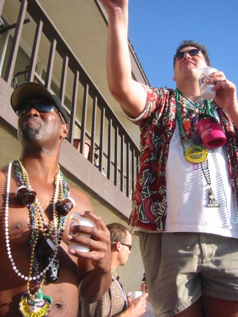 Darryl throwing beads