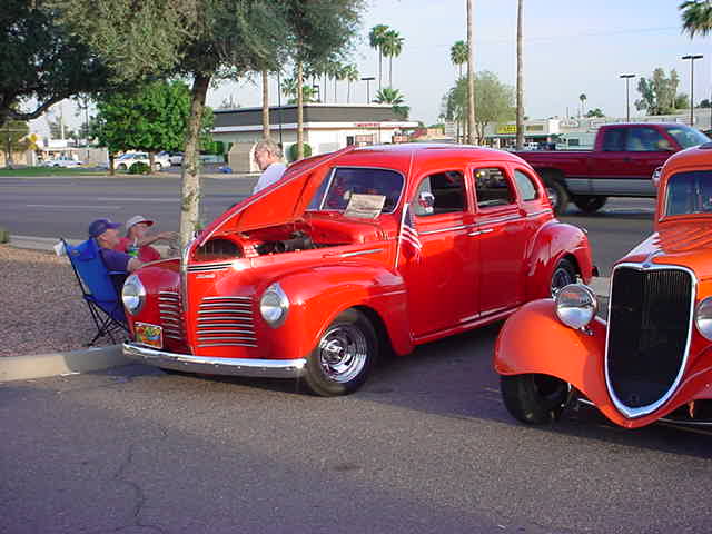 red 1940 P-10<br>Plymouth + Ford