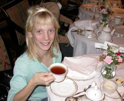 Julie toasts with tea