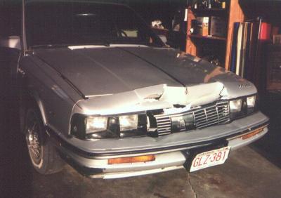Same 87 Olds, 3 years later after being clobbered by a deer when Nancy was driving from  a canoe trip