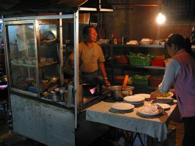 Hawker selling fried noodles