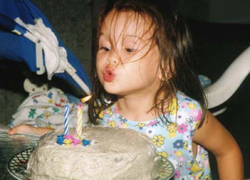 3rd B Day blowing out candles 4x6.JPG