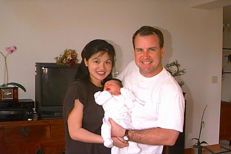 With mom and dad just a few days old5x7.JPG