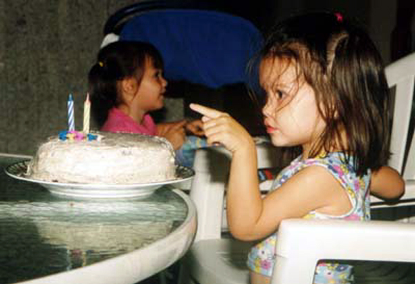 3rd B Day counting her candles 4x6.JPG