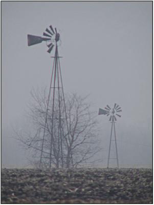 Two Windmills in the Mist