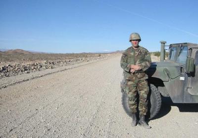 SSgt Adlerz with snow covered Big Bear Mt. in back