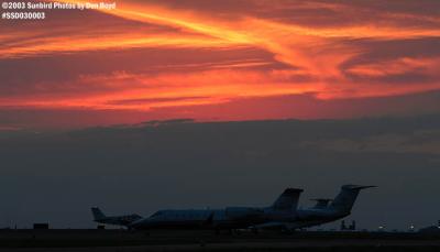 FBO ramp sunset aviation stock photo #3652