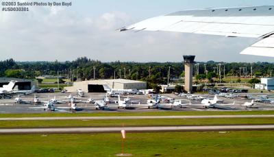 2003 - FBO ramp and Air Traffic Control Tower airport stock photo #3604