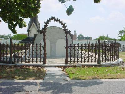 WroughtIronWoodenFence.jpg