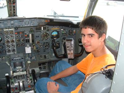 Jason exploring A/C 824: 737-200's cockpit (Advisor Chris' aircraft)