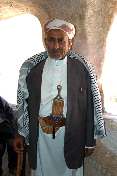 Yemeni man in the cave at Dar al-Hajar