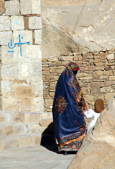 Yemeni woman in a colorful dress