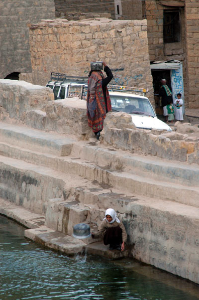 Girl fetching a pail of water, Hababa