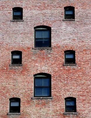 Brick and windows - old warehouses
