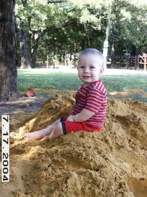 Playing in Daddy's sand pile...