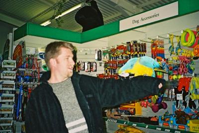 Clint and a giant Macaw in a massive 'Bunnings' like store near Bicester.