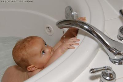 Baby peering @ Faucet (V12)