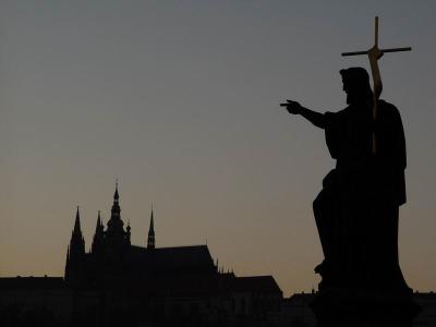 Statue on Charles Bridge, Prague Castle in the background
