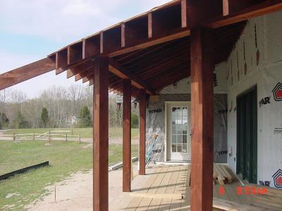 From the dining room, looking down the porch, past the den, to the laundry room door