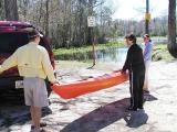 Matt and Darby help Patty with kayak