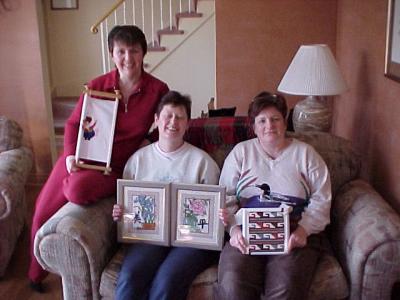 March 30th 2003 and Margaret makes it first to the post with the 2nd of her oriental pair.
Ann-Marie has almost finished her south west design and Susie's new Toy Story 2 is coming along nicely now too.