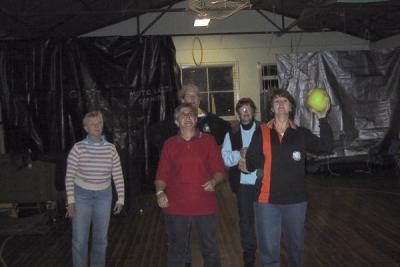 The girls team playing 'basket ball'.