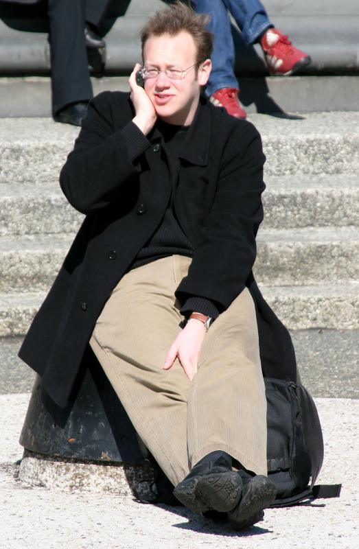 Enjoying a Cell Conversation at the Fountain
