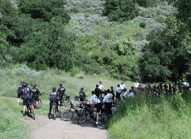 SJPD on a bike climb exercise