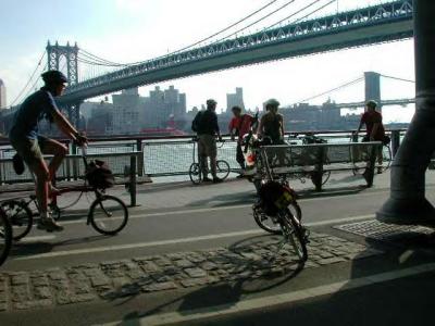 Late afternoon's lengthening shadows, a warm summer breeze, and a great view of both the Manhattan and Brooklyn Bridges made this a nice spot for a break....