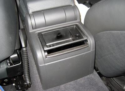 Go to the back seat and slide the rear ashtray cover all the way down till the ashtray pops up