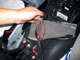 Open the bundled wires, you need to use the WHITE/PURPLE wire for + positive and brown wire for negative