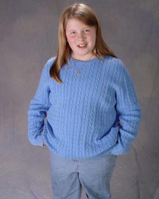 Kim-blue-sweater-standing.jpg