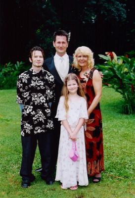 Justin with Mom Sister Brother.JPG