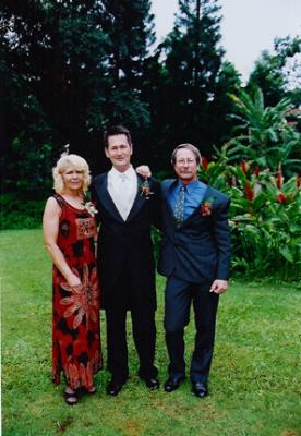 Justin with his Mom and Dad3.JPG