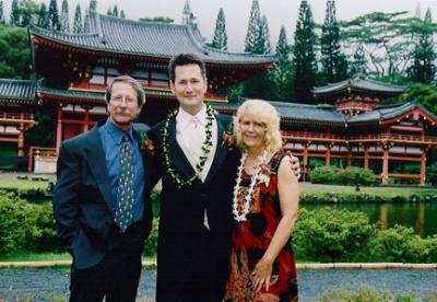 Justin with his Mom and Dad4.JPG