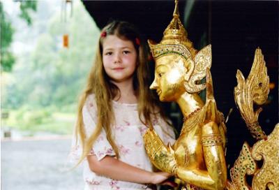 Alex with Golden Statue.JPG