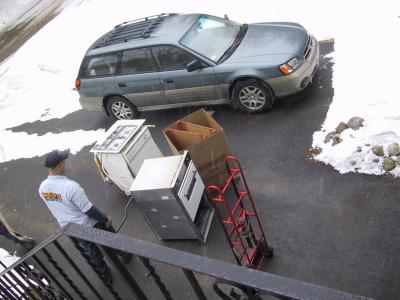 Appliance guys take away the old appliances