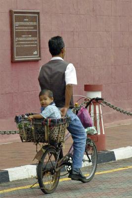 Kid on bicycle, Melaka, Malaysia