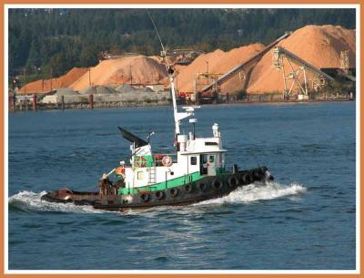 Tugboat hustles to next job.