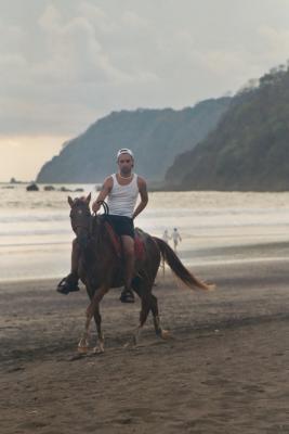 Man on horse, Jaco Beach