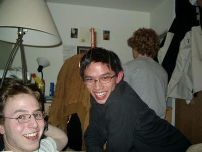 Drunken me with a head massager, and my fraternal big bro in the foreground